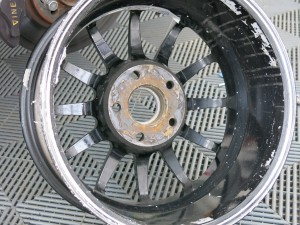 During qualifying a parts failure, rubbing against the back wheels acted as a break and caused rim damage