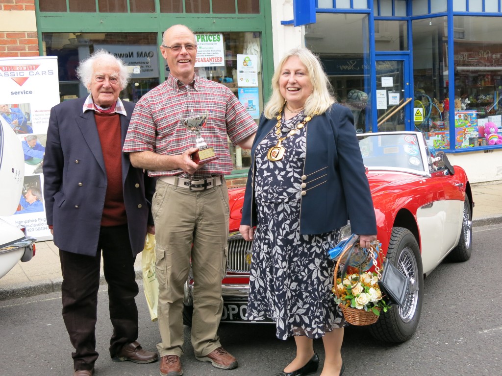 Jonathan Philips was over the moon to receive his prize for his 1966 Austin Healey 3000
