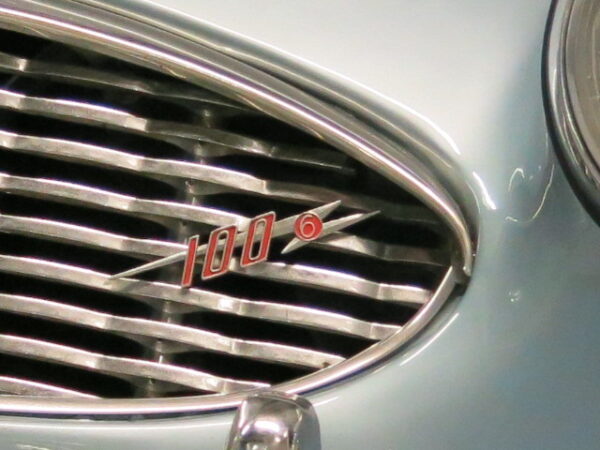 The well known 100-6 grille badge is different from the other marques of Healey