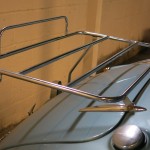 A luggage rack could be mounted on the boot lid hinge pins and clamped to the trailing edge of the boot lid