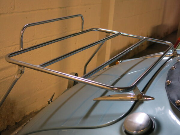 A luggage rack could be mounted on the boot lid hinge pins and clamped to the trailing edge of the boot lid