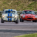 Jack Rawles, racing an Austin Healey 3000 has an exciting battle against a Jaguar E Type, during the penultimate lap of the Classic K series in the Classic Sports Car Championship at Thruxton race circuit, August 2016