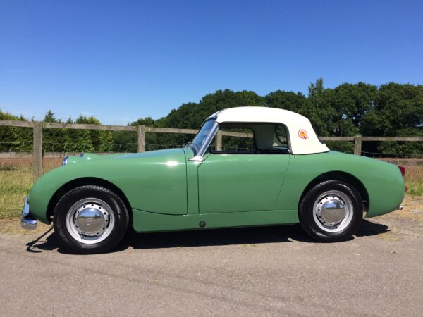 Austin Healey Frogeye Sprite MKI for sale at Bill Rawles Classic Cars, beautifully restored, leaf green with a white hardtop