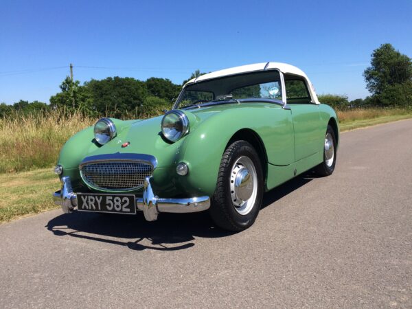Austin Healey Frogeye Sprite MKI for sale at Bill Rawles Classic Cars, beautifully restored, leaf green with a white hardtop