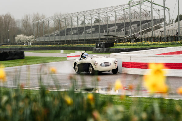 Jack Rawles test driving an Austin Healey 100S at Goodwood circuit ahead of the up coming 81st Members Meeting taking place 13th to 14th April 2024 - Photo Credit @anonymous_visual